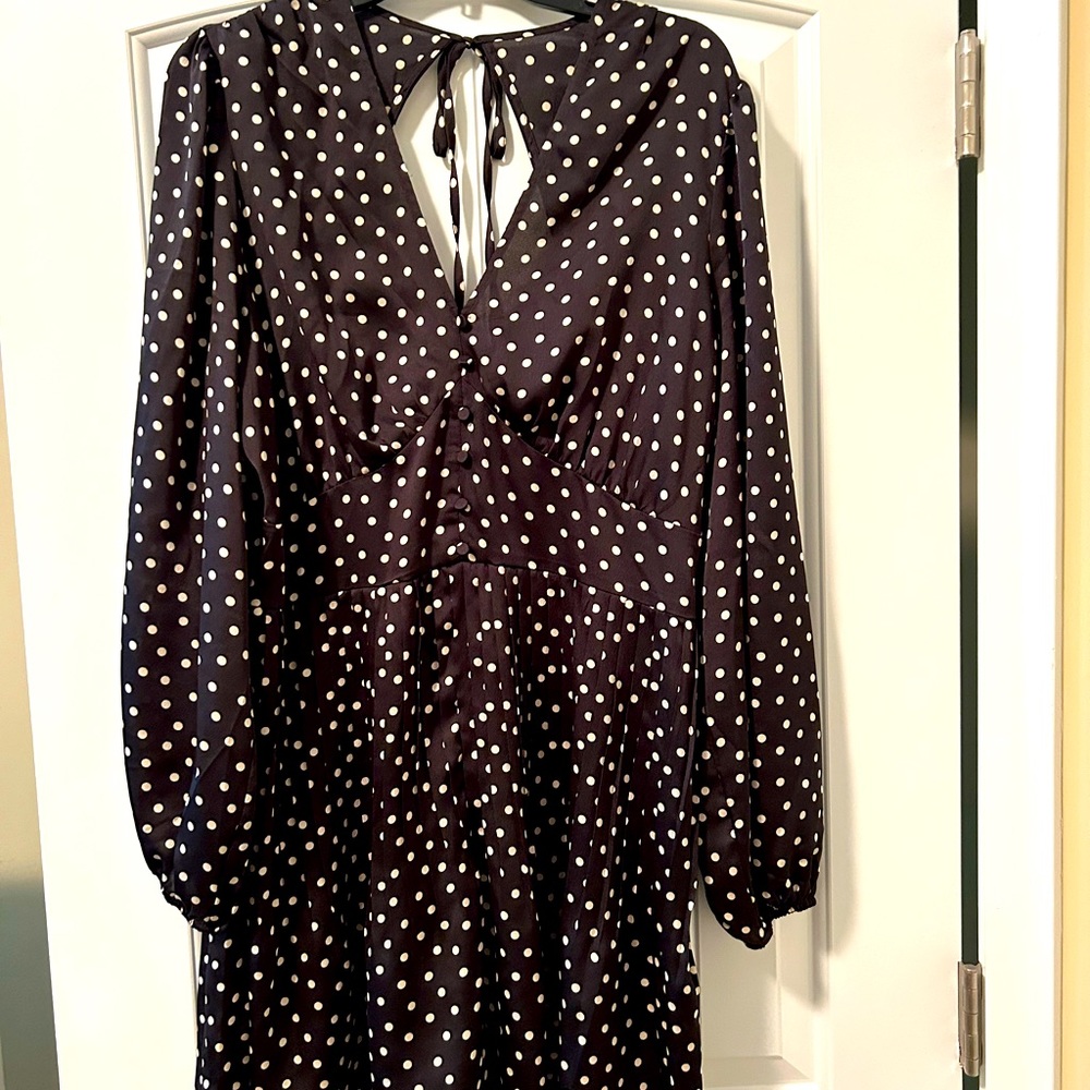 Polk dot long sleeve romper with cut out back